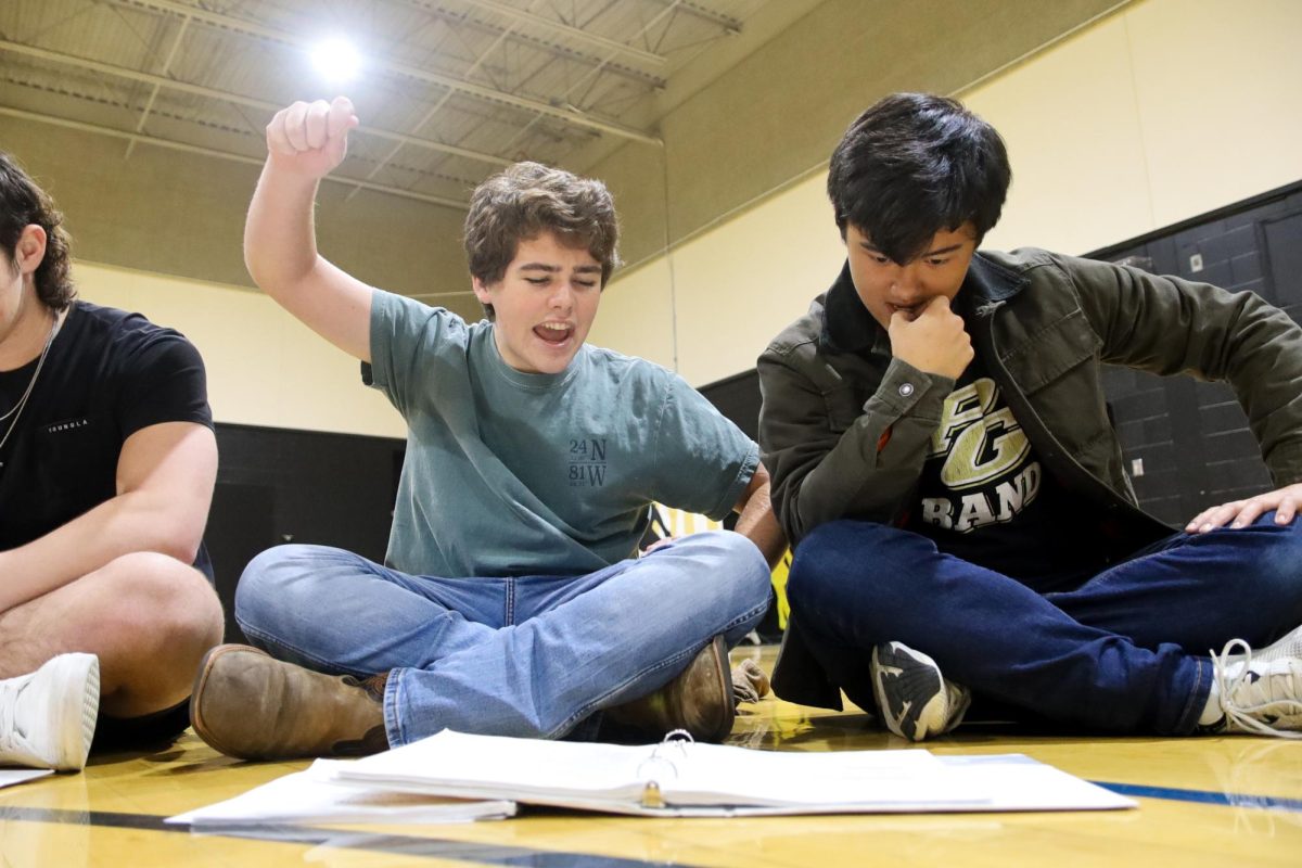 Senior Tate Bass practices lines with Junior Owen Braza