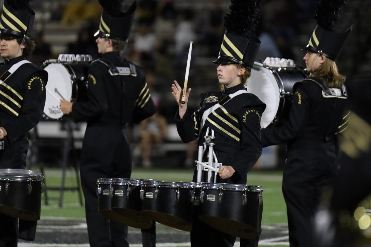 Drumming+to+Their+Own+Beat